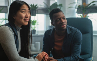 two partners seeking couples therapy