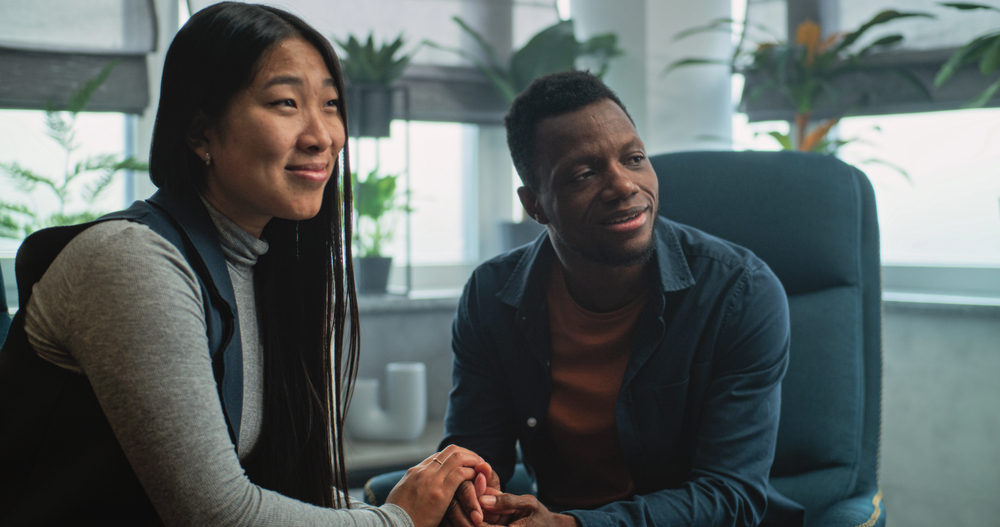 two partners seeking couples therapy